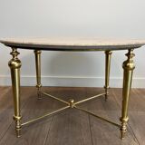 Brass coffee table with a white marble top.