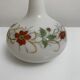 Old vase in opaline floral decoration painted