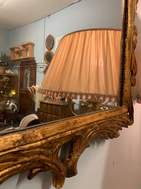 Carved gilded wood mirror