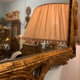 Miroir en bois doré sculpté