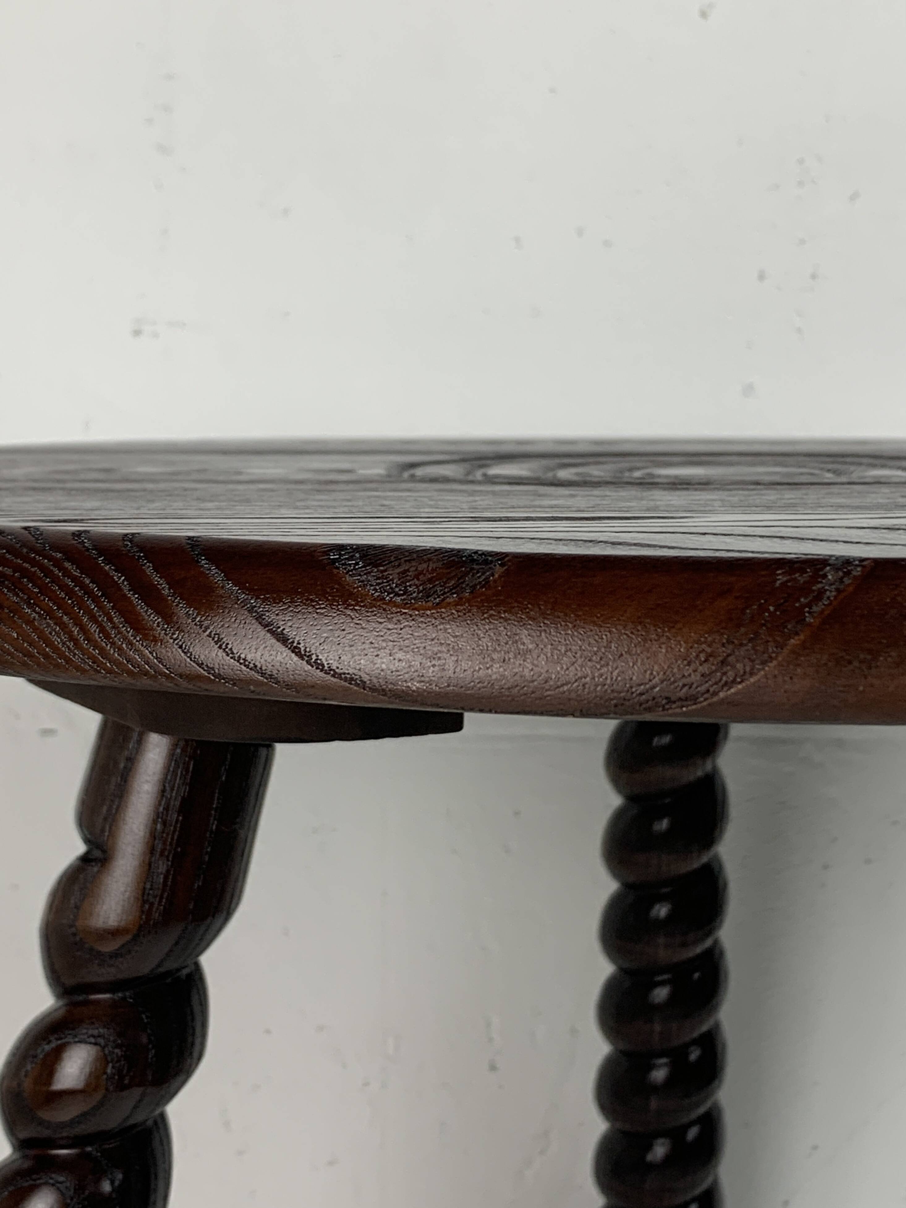 French modernist wood turned bobbin side sable in the manner of Charles Dud