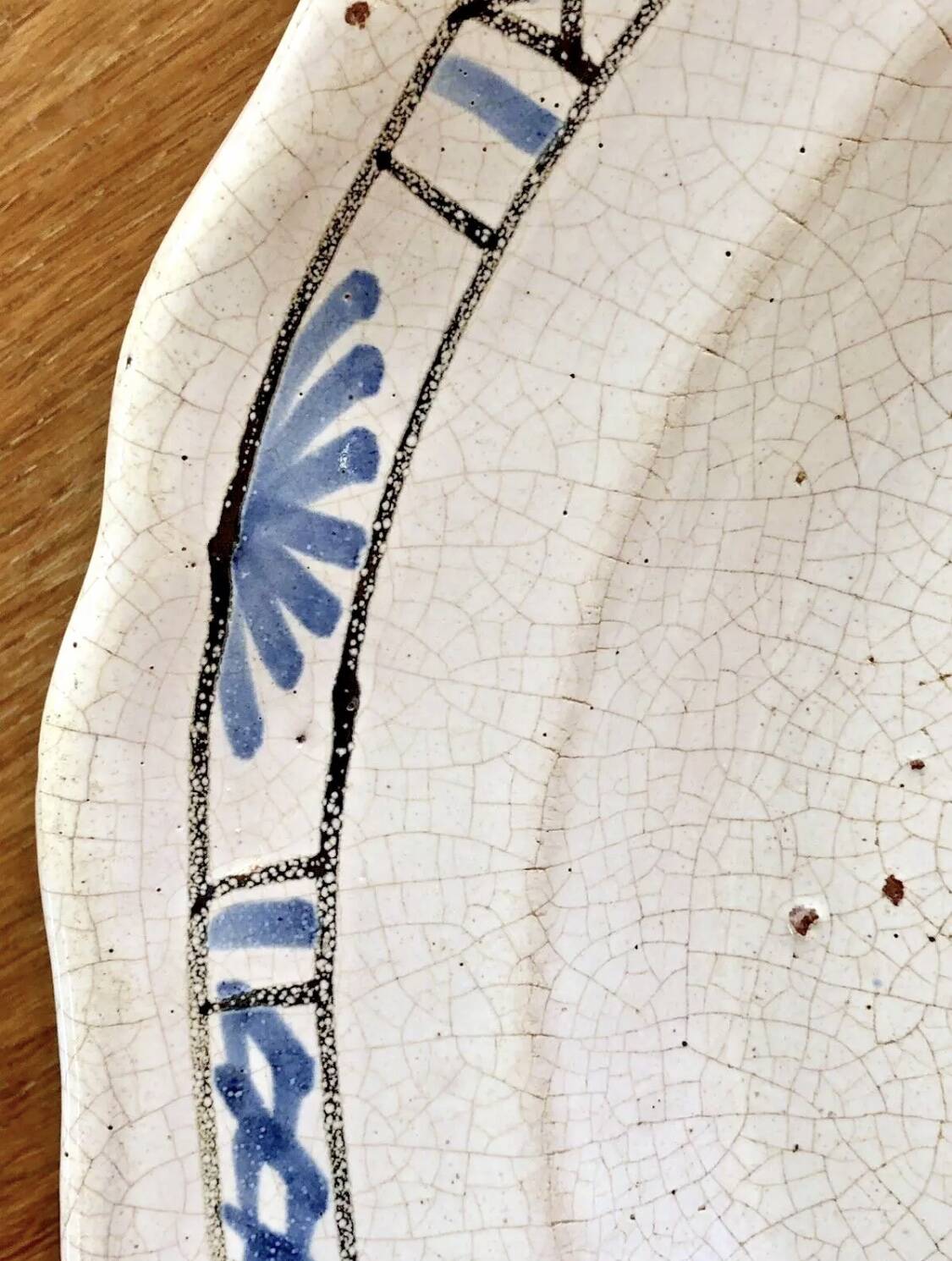 Old round hollow dish XVIII black bottom Rouen Forges les eaux