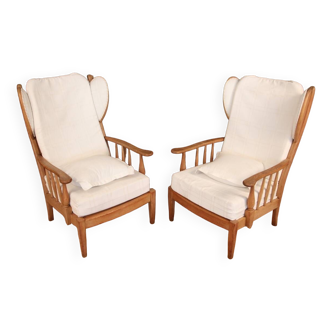 Pair of armchairs with ears of the 50s in oak