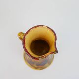 Beautiful ceramic pitcher in fire colors