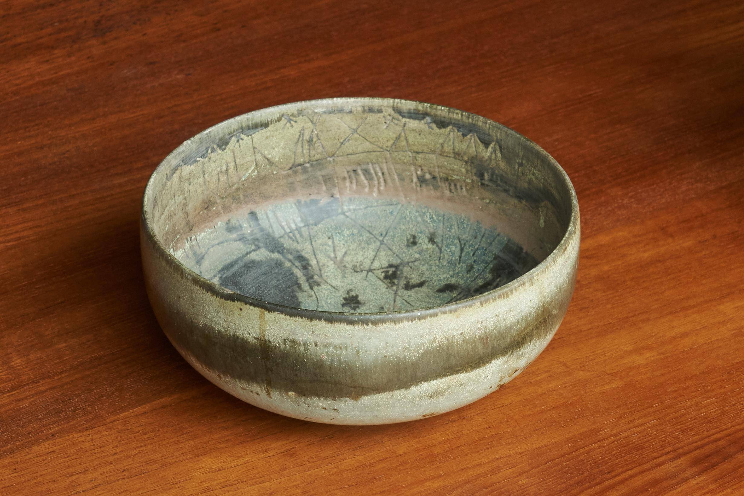 Mid-century ceramic bowl with incised decoration.