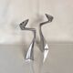 Pair of aluminium candlesticks by Matthew Hilton