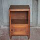 Wooden bedside table with compartment, reconstruction period.