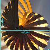 Nautilus shell-shaped chandelier made from bamboo slats