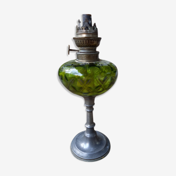 Old nineteenth century kerosene lamp made of glass and regulated