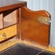 Commode de campagne estampillée Army & Navy C.S.L avec bureau rabattable