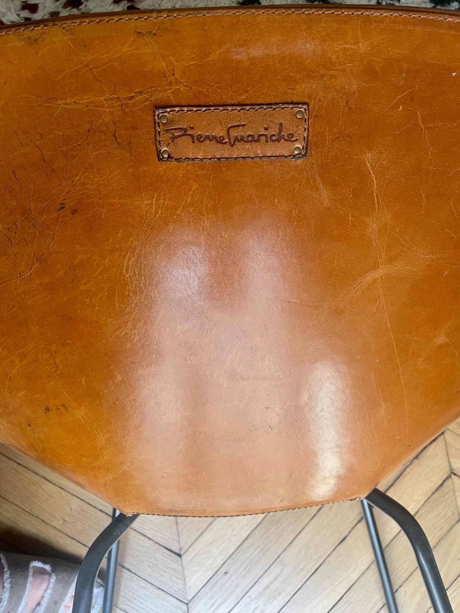 Chair "Tonneau" Pierre Guariche in leather