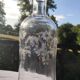 Two antique engraved glass bottles