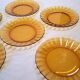 6 Duralex dessert plates in good condition, made of amber-yellow glass