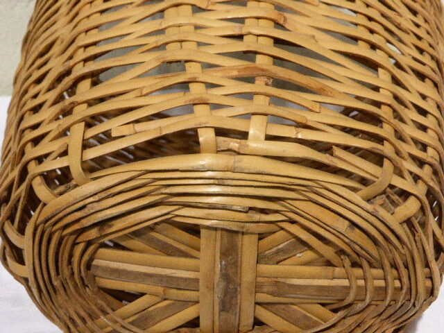 Basket has handles, braided vintage