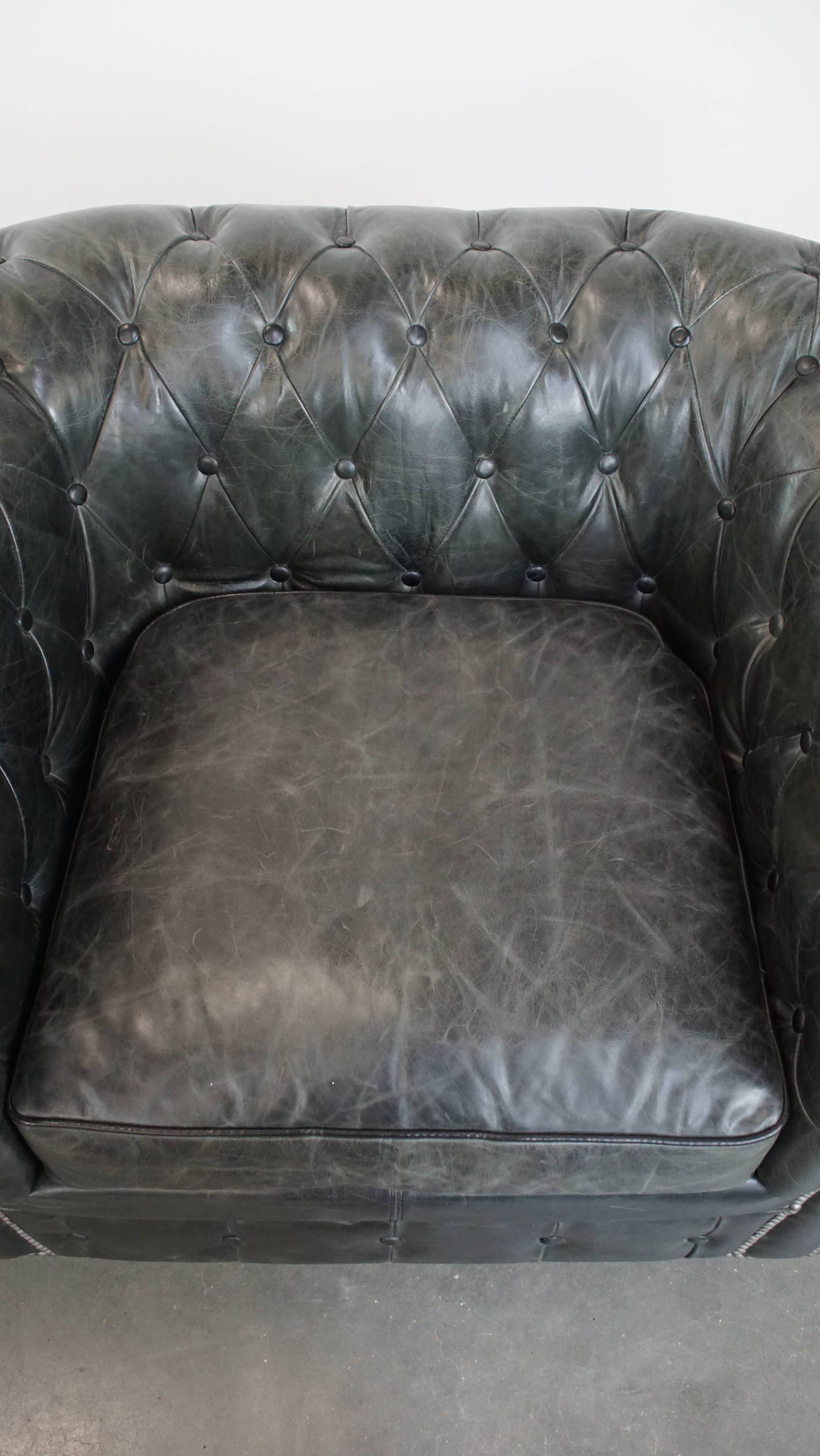 Set of 2 black Chesterfield armchairs in grained cowhide leather
