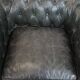 Set of 2 black Chesterfield armchairs in grained cowhide leather