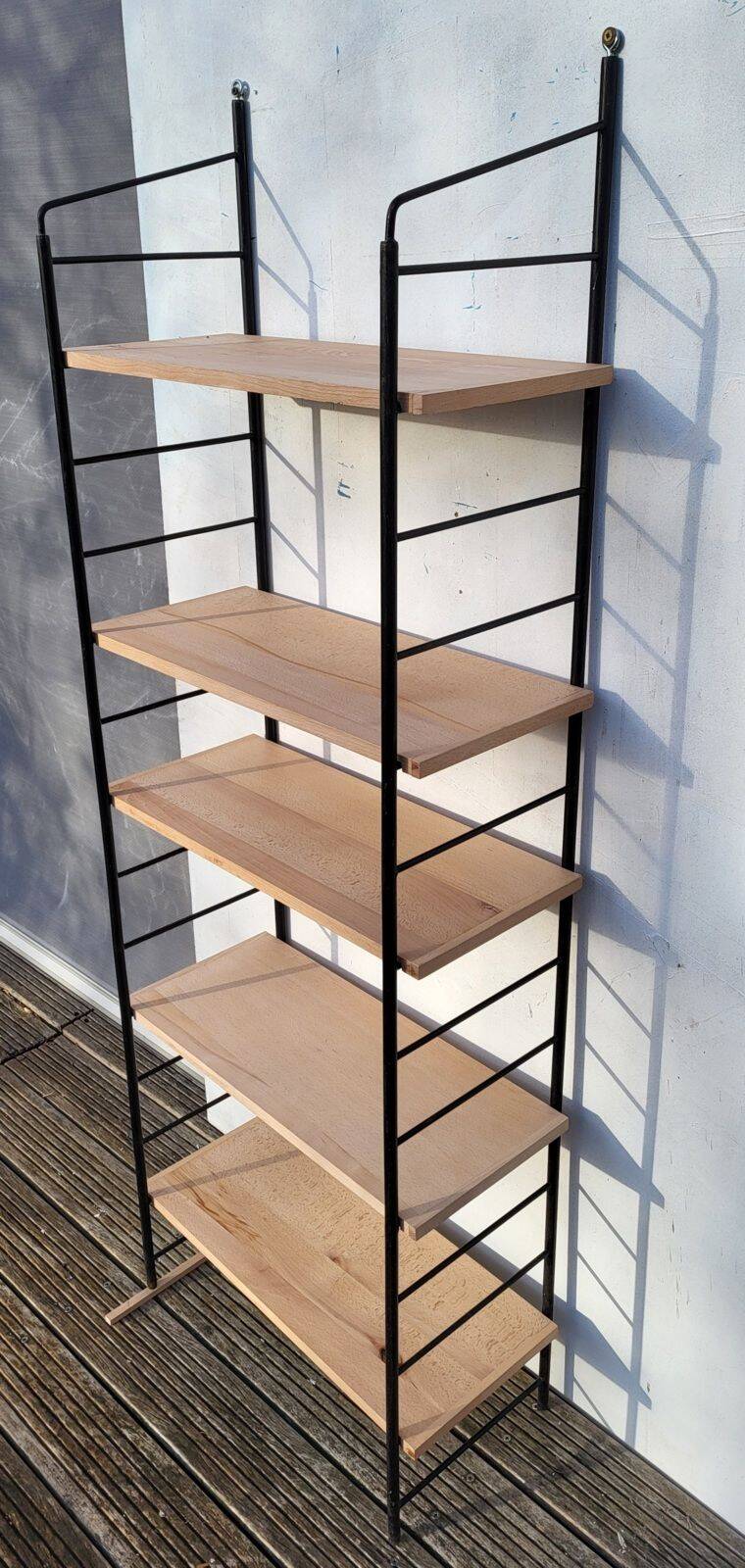 Large String shelf with wooden ladders and metal.