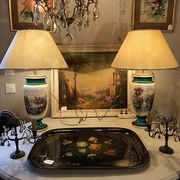 Large pair of 19th century polychrome porcelain vases decorated with landscapes, mounted as lamps