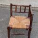 19th-century turned wooden corner chair with rush seating.