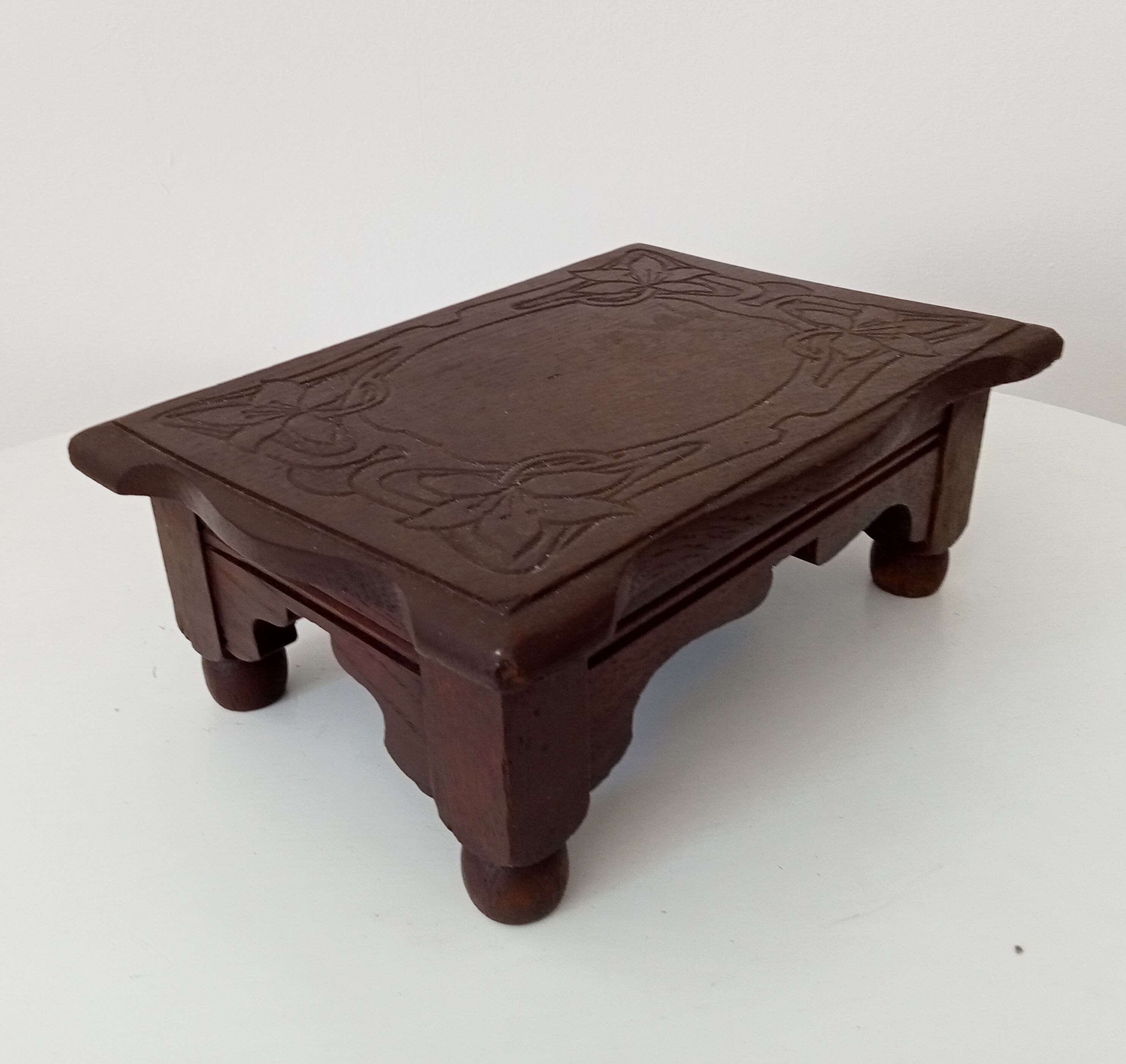 Antique carved wooden stool
