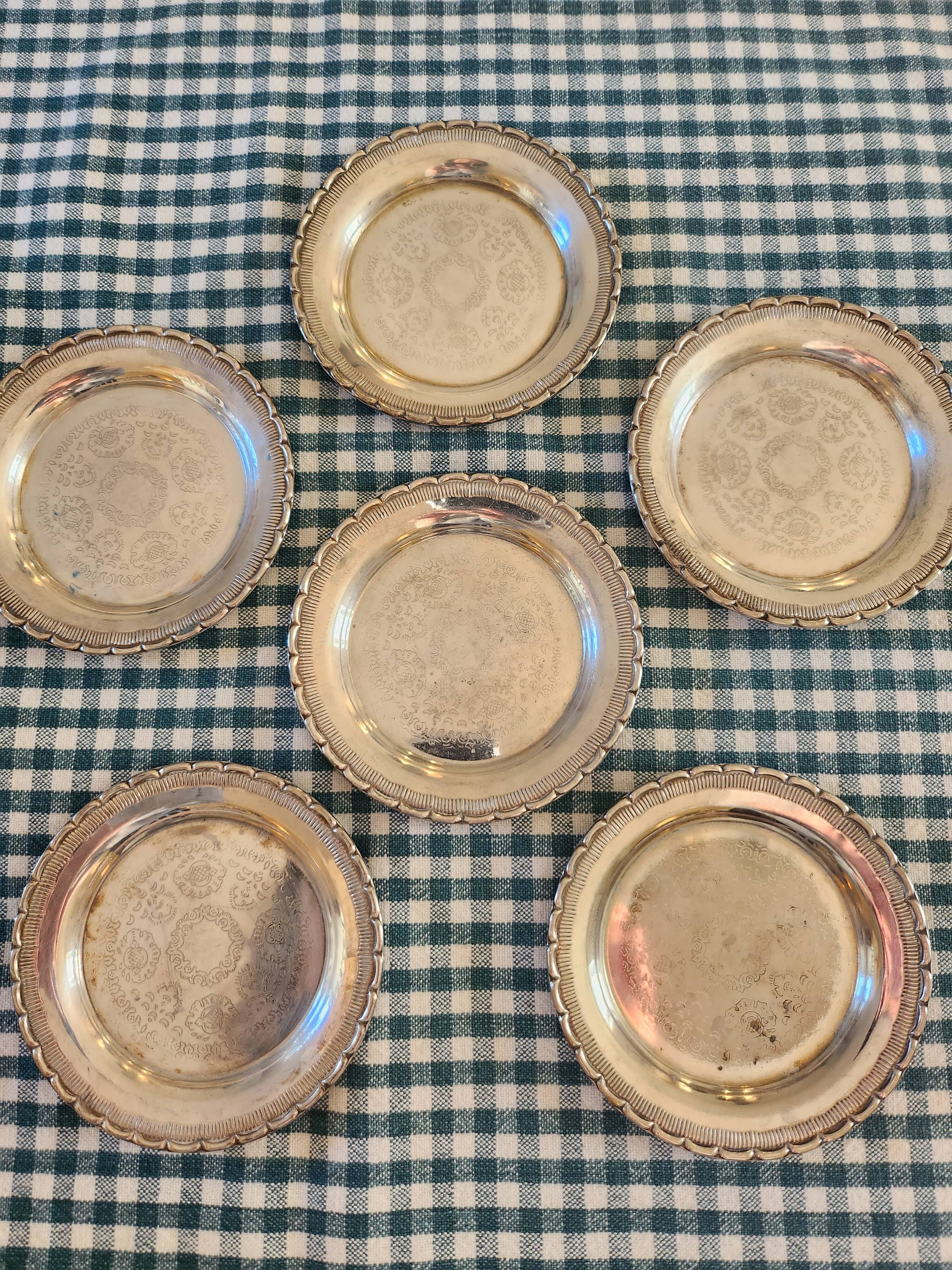 6 coasters engraved in silver metal