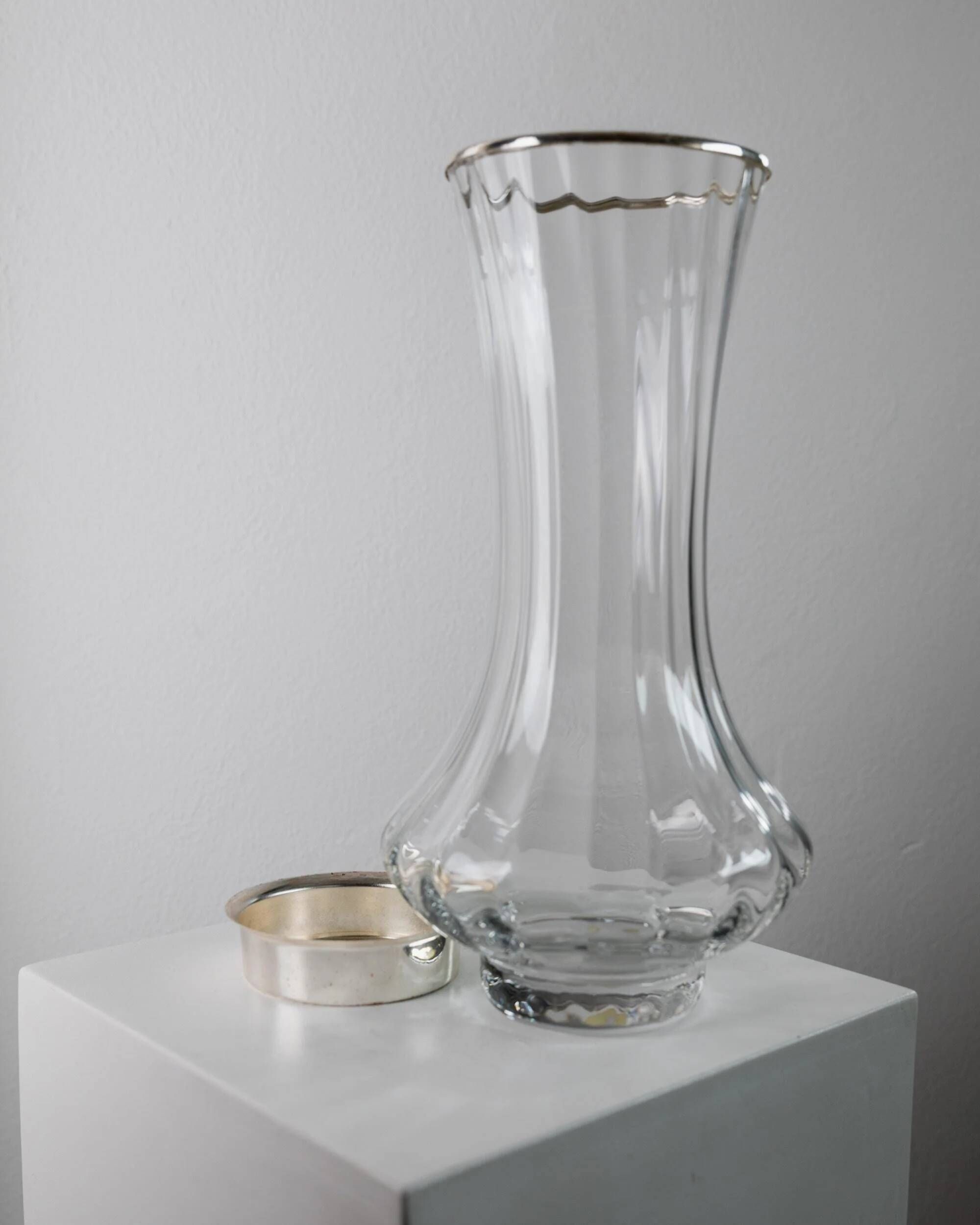 Vintage glass vase from the 1980s, transparent glass with fine linear pattern and silver metal details, elegant sculptural flower vase, gift idea.