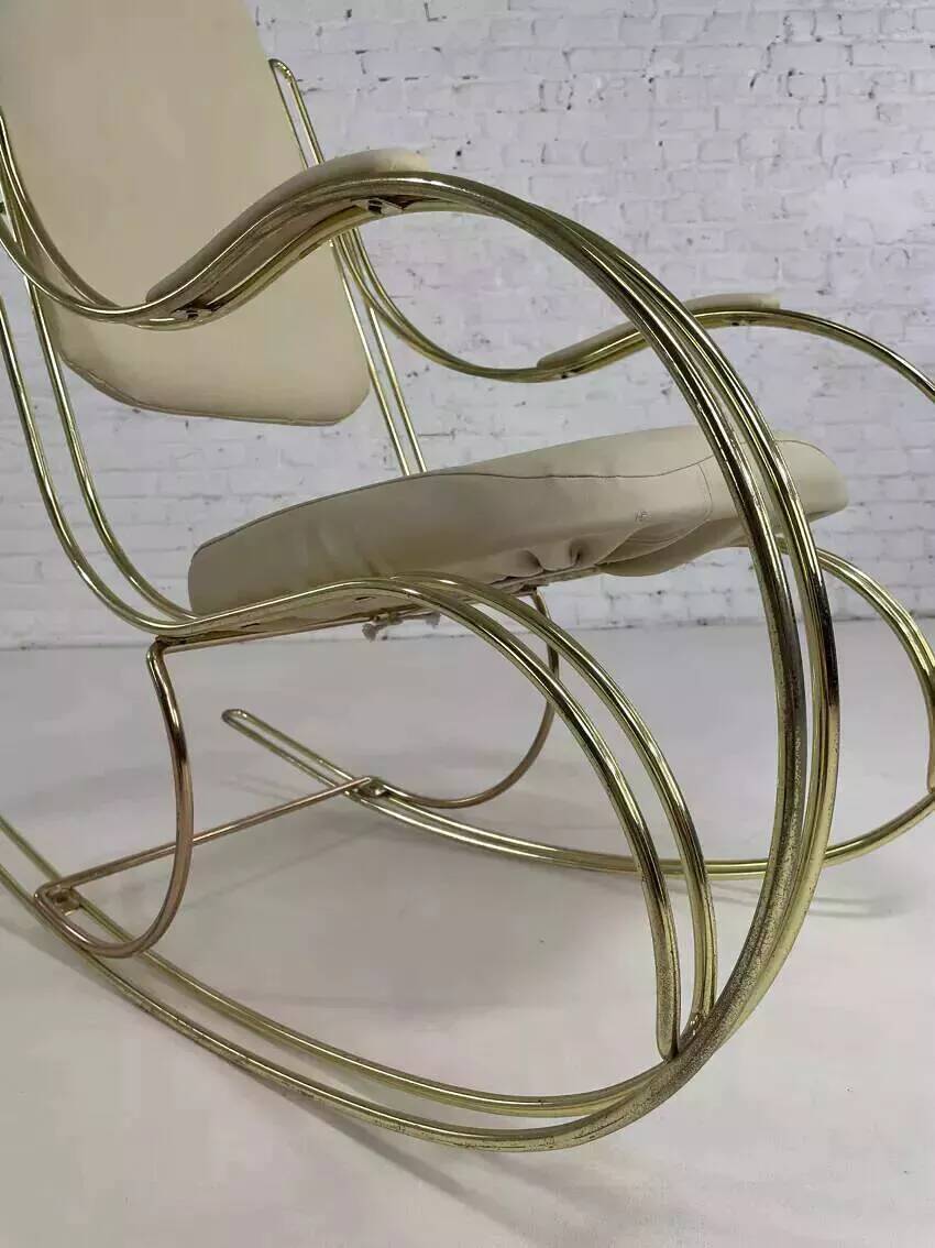1960s rocking chair in brass and ecru imitation leather