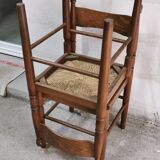 Pair of vintage wood and straw chairs
