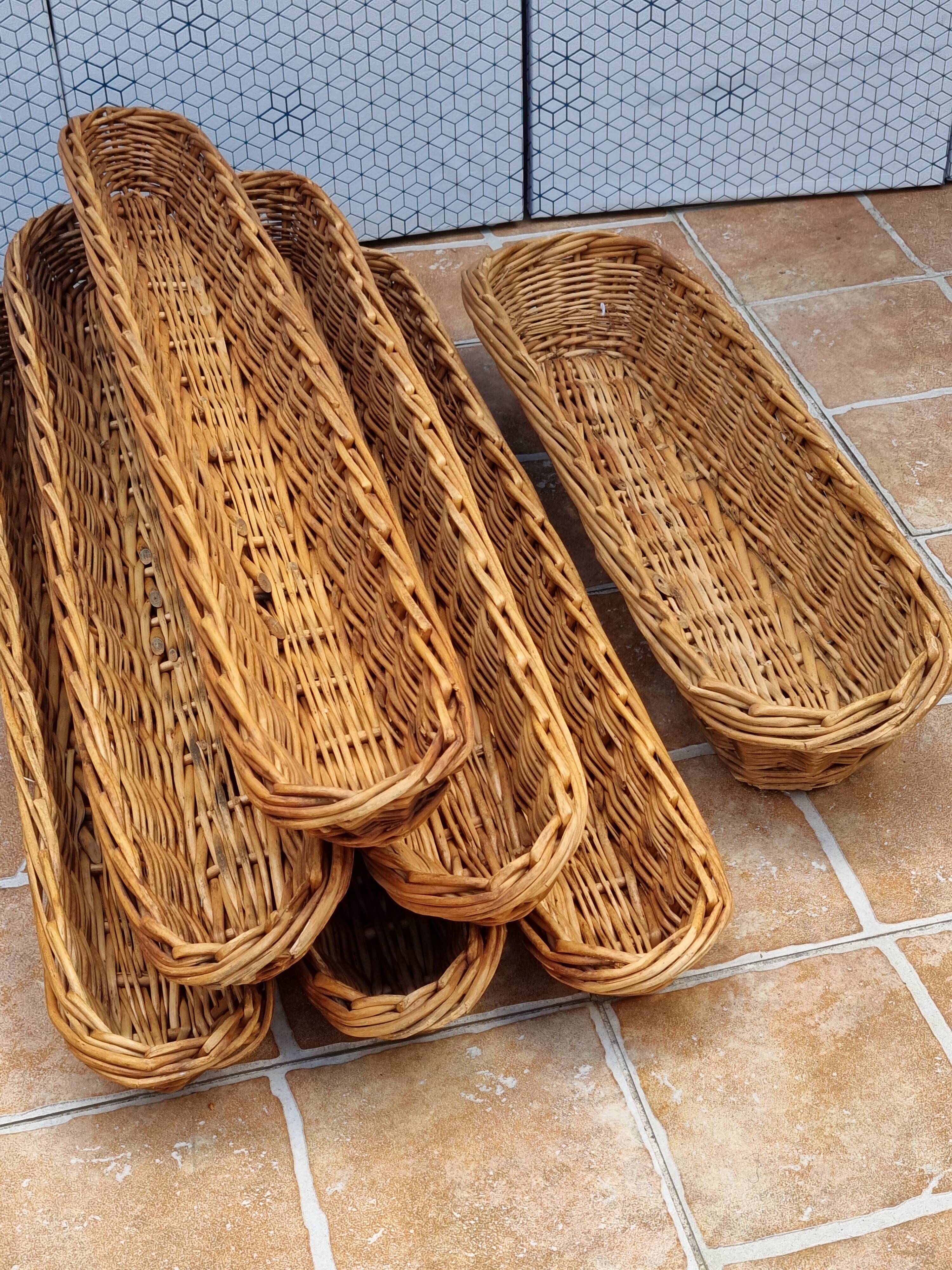 Set of 7 wicker baker's baskets, 1960s