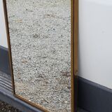Mirror of the 70s in gilded metal, 60x35 cm