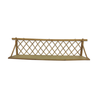 Wall shelf in rattan 50s