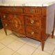 Dresser to music attributes of Louis XVl era