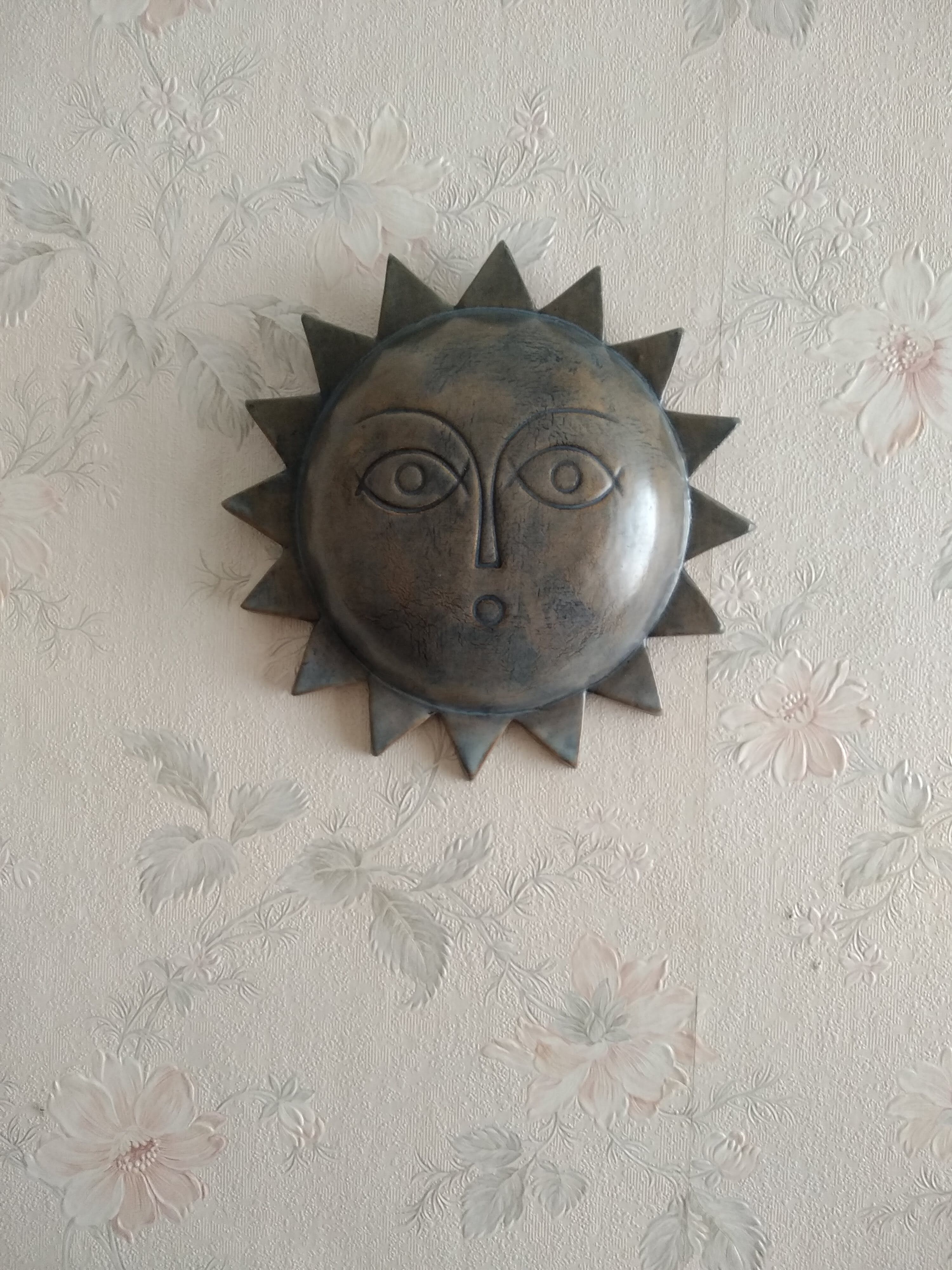 Vintage ceramic sun signed