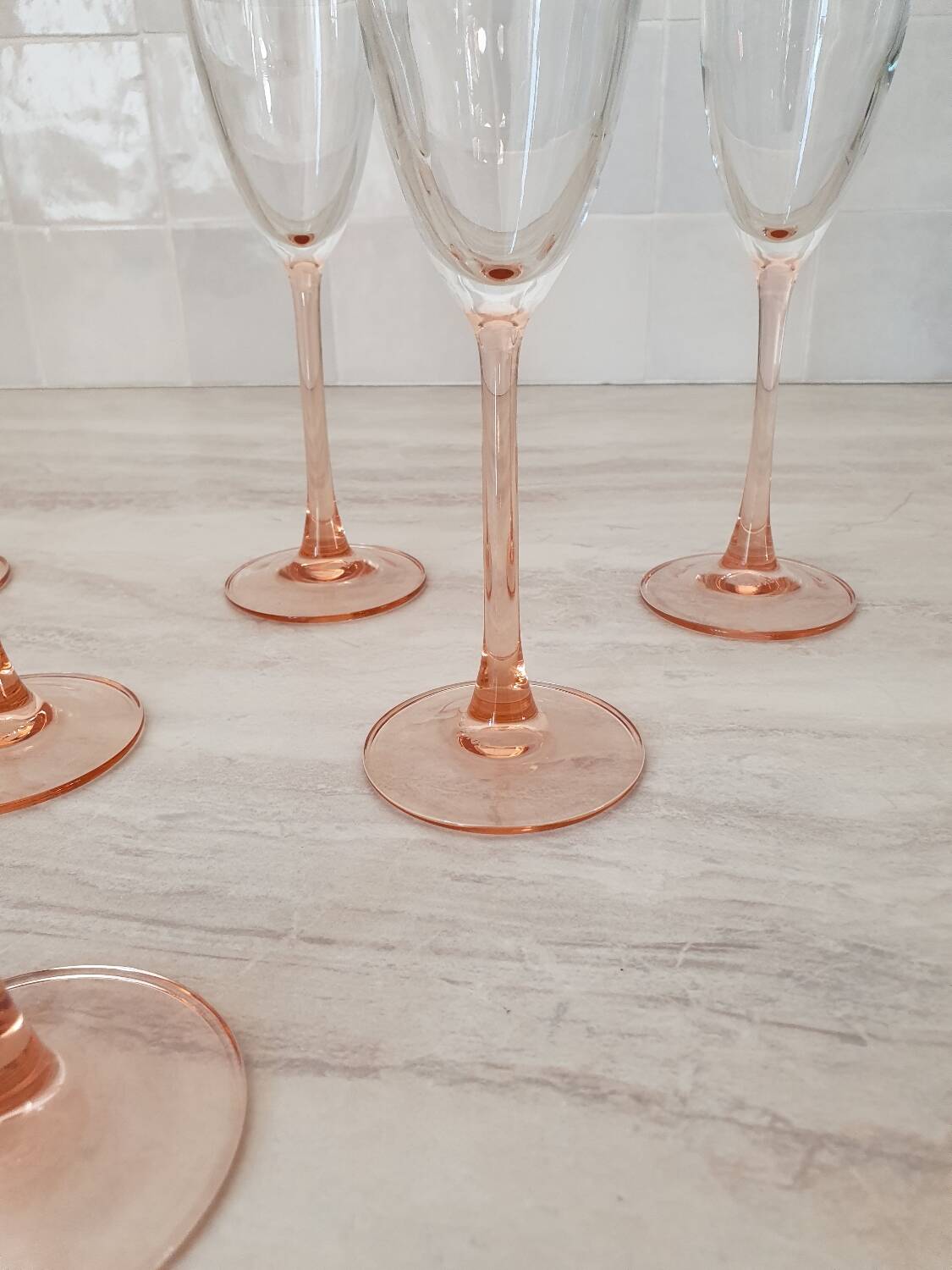 6 champagne flutes with pink stems