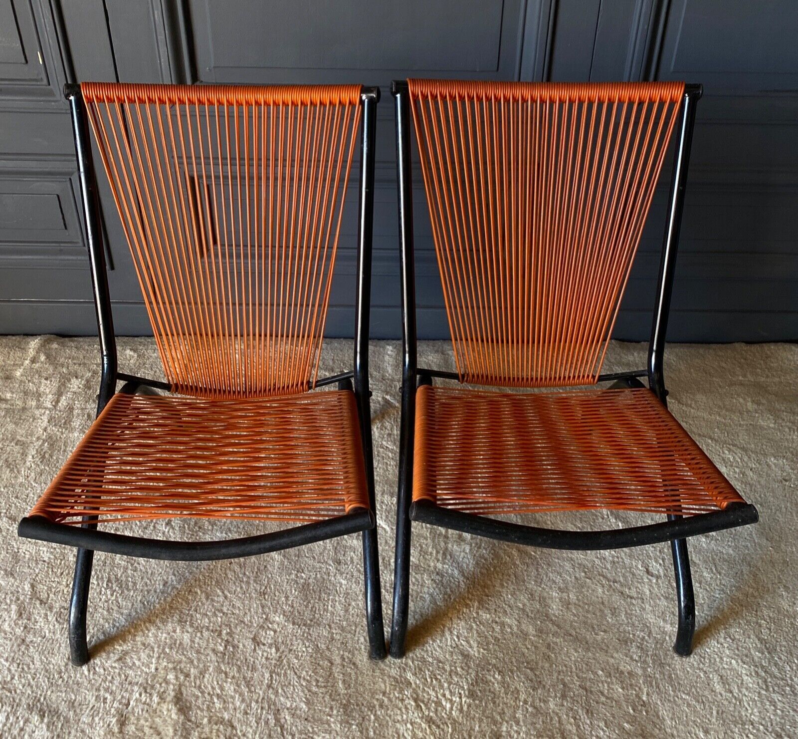 Suite of 4 folding armchairs scoubidou red and tubular black 1960