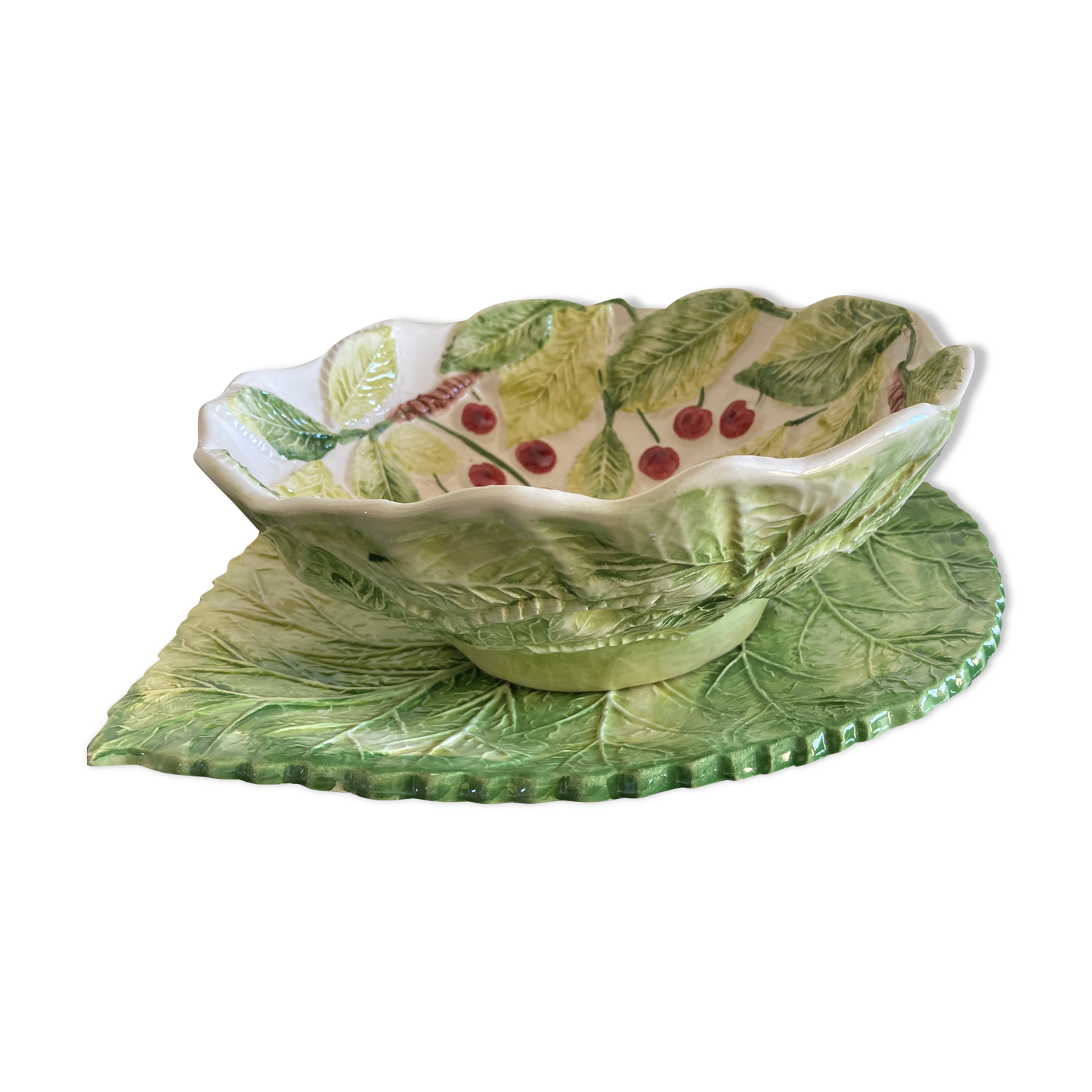 Cherry-decorated drainer fruit cup with its leaf-shaped dish