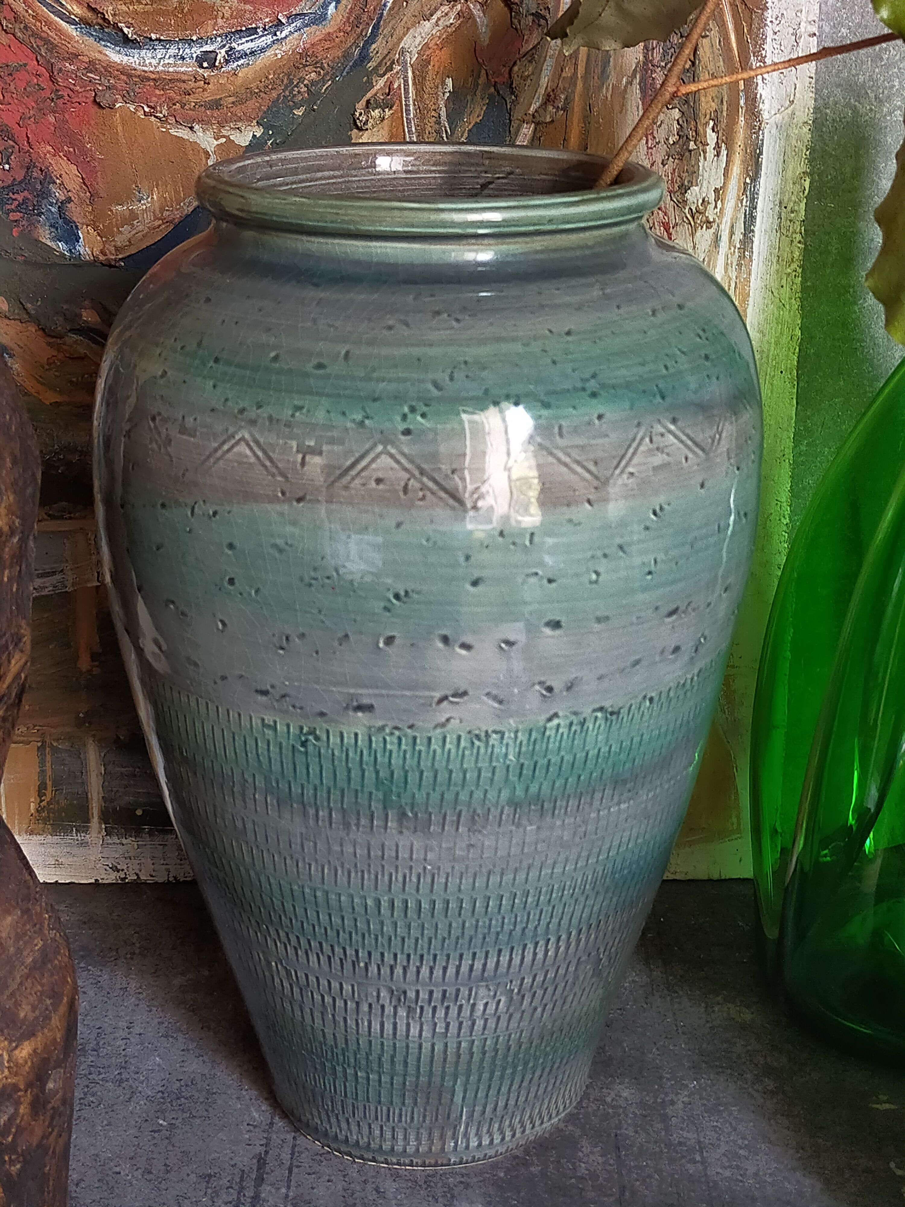 Oblong ceramic vase sacrificed with blue enamel