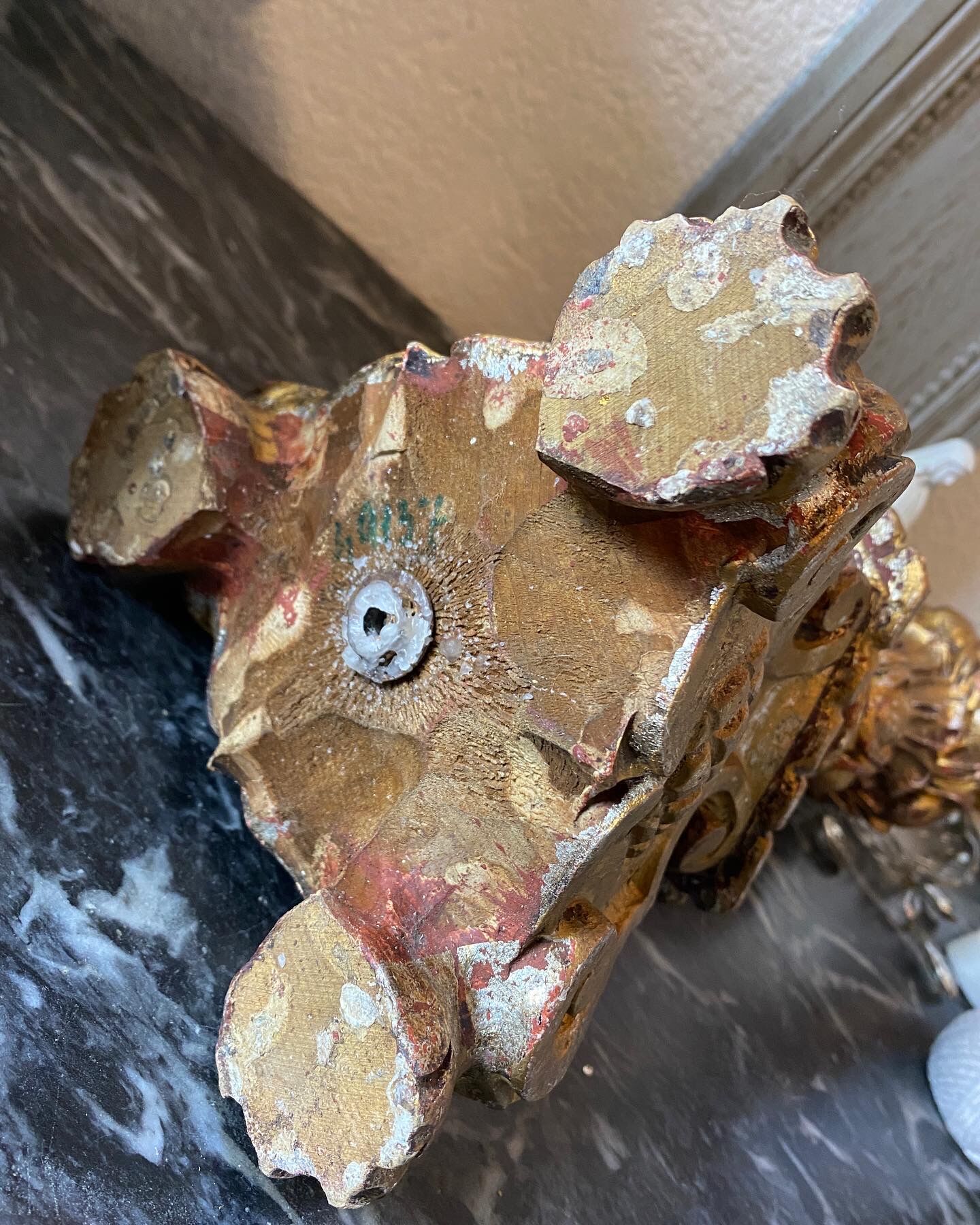 Picnic candle in old gilded wood