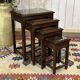 Set of 4 Chinese nesting tables in teak from the 1980s.