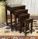 Set of 4 Chinese nesting tables in teak from the 1980s.