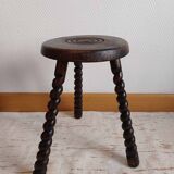 Brutalist tripod stool with twisted legs