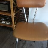 2 chairs in faux leather