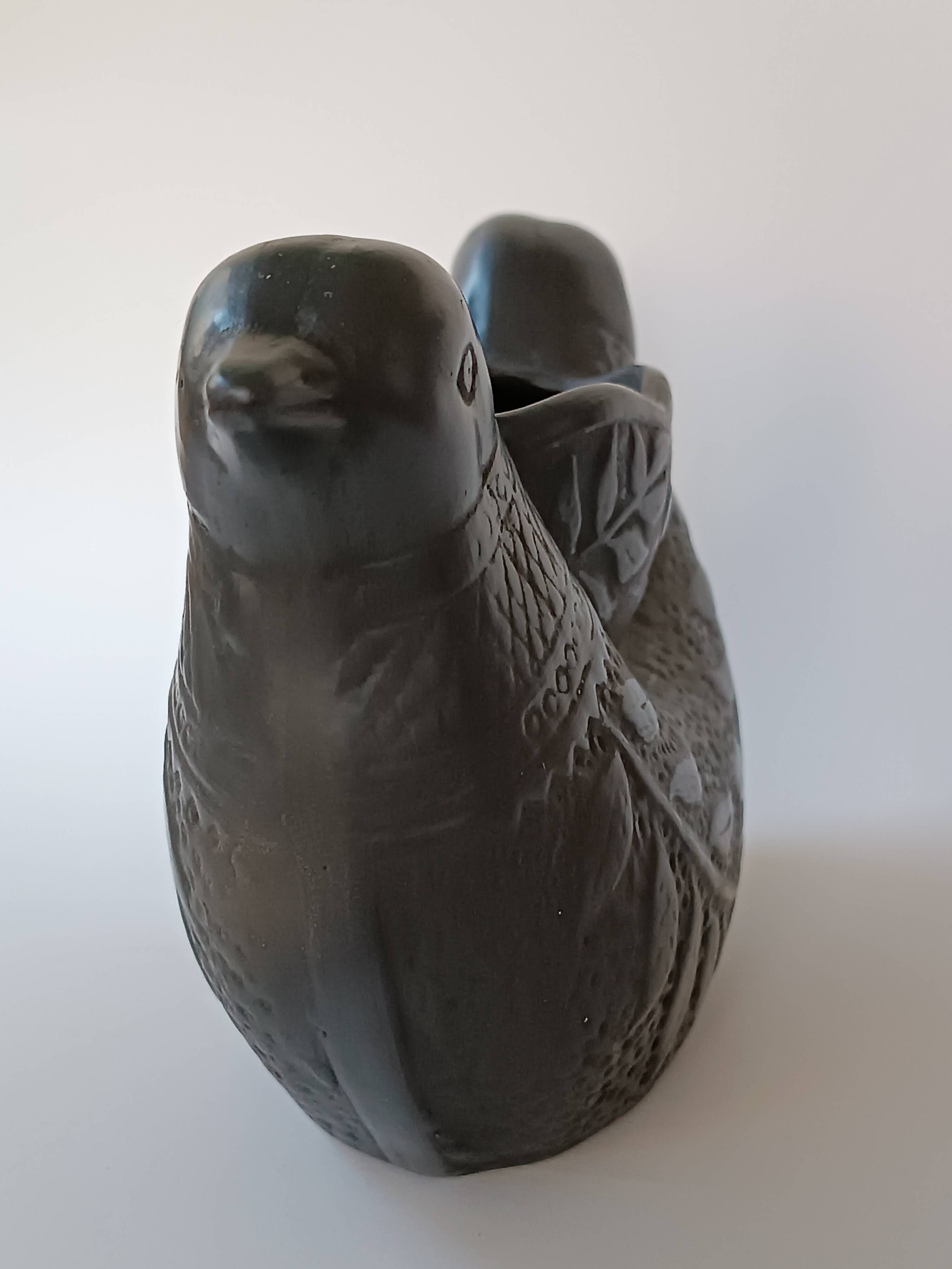 Zoomorphic vase with double birds in black clay from Marginea, Romania.