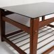 Mid-century Swedish coffee table, black glass and teak wood, 1960s.