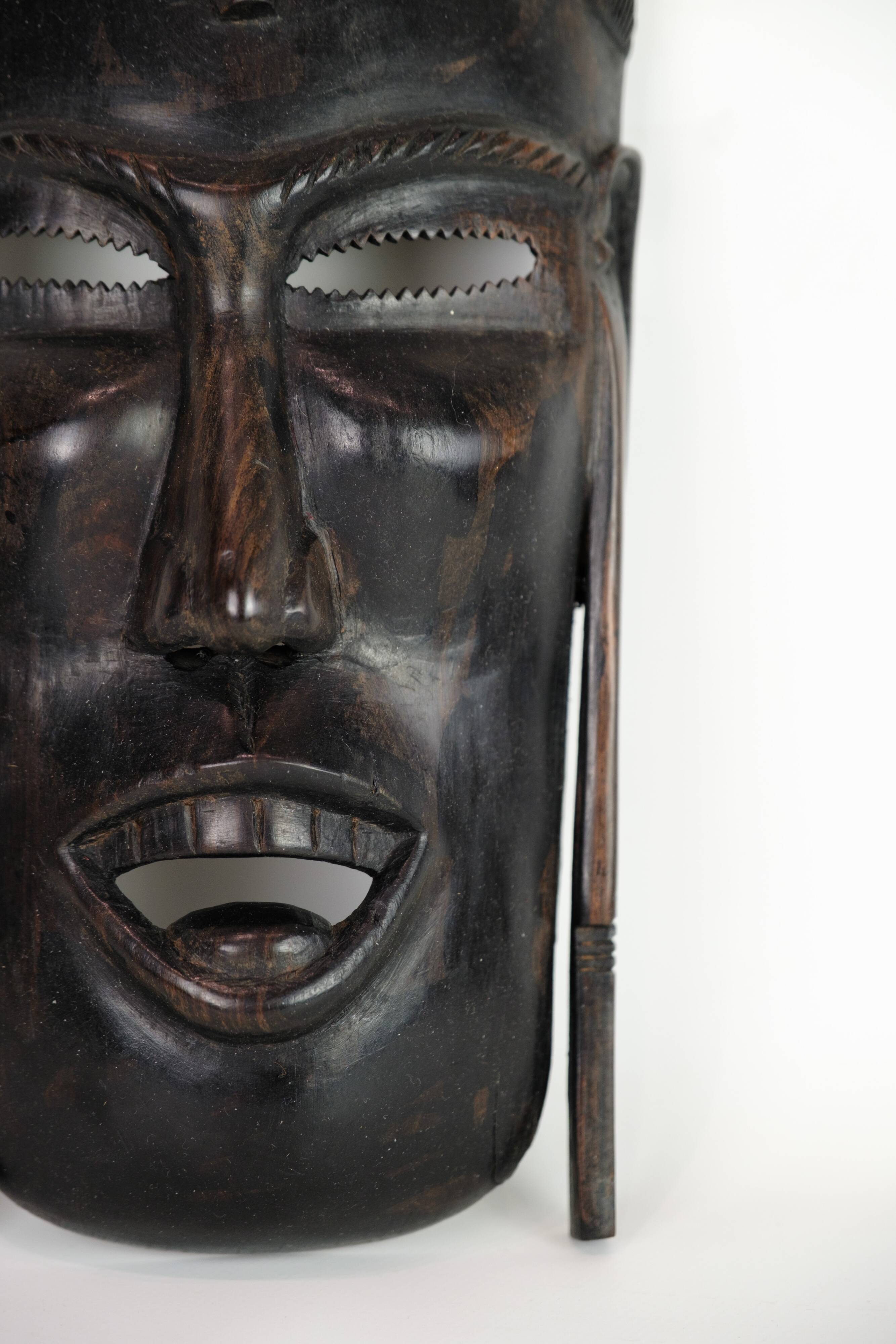 African Mask Hand Craved In Dark Wood From West Africa