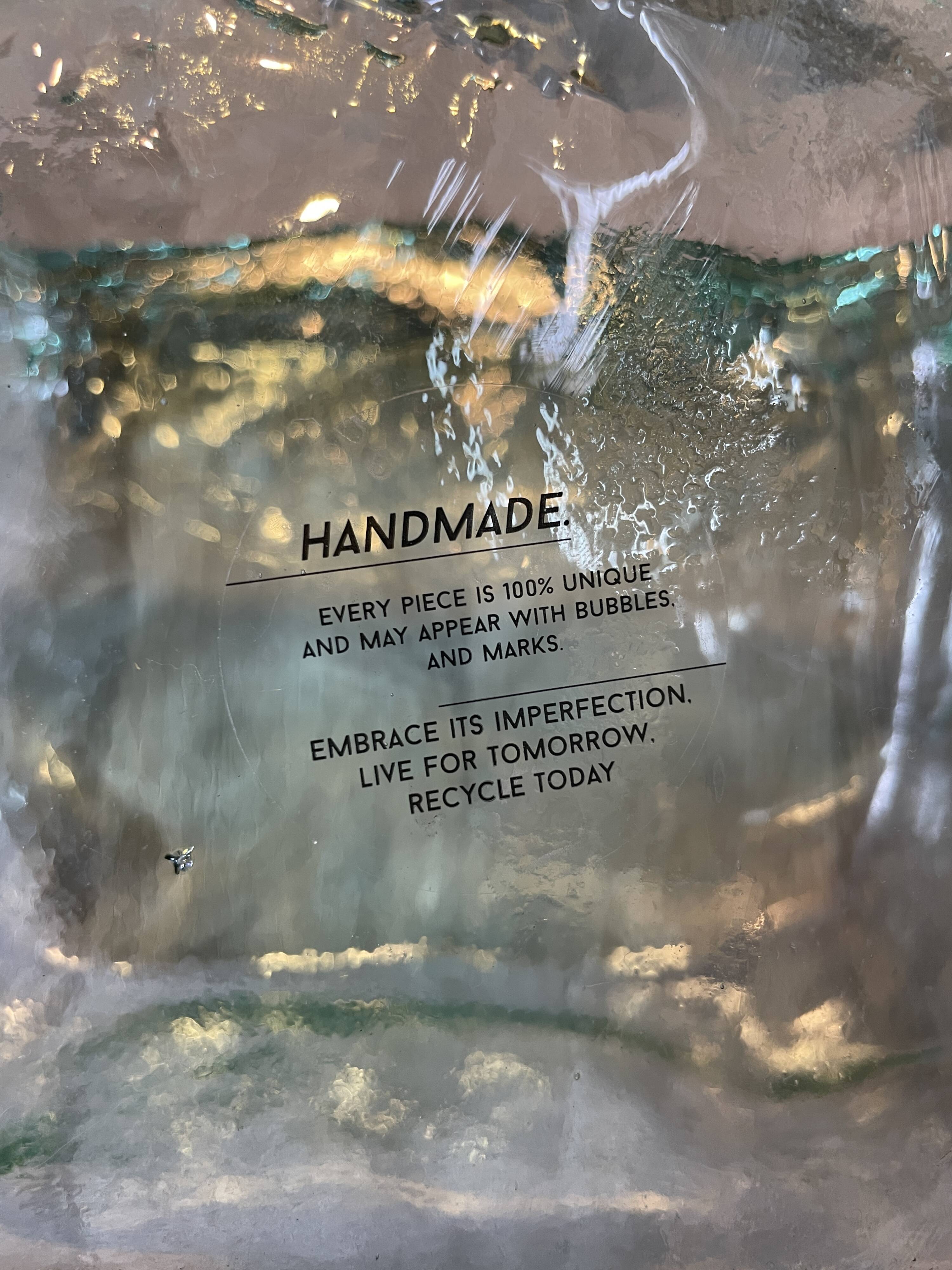 Small, free-form, organic glass jar