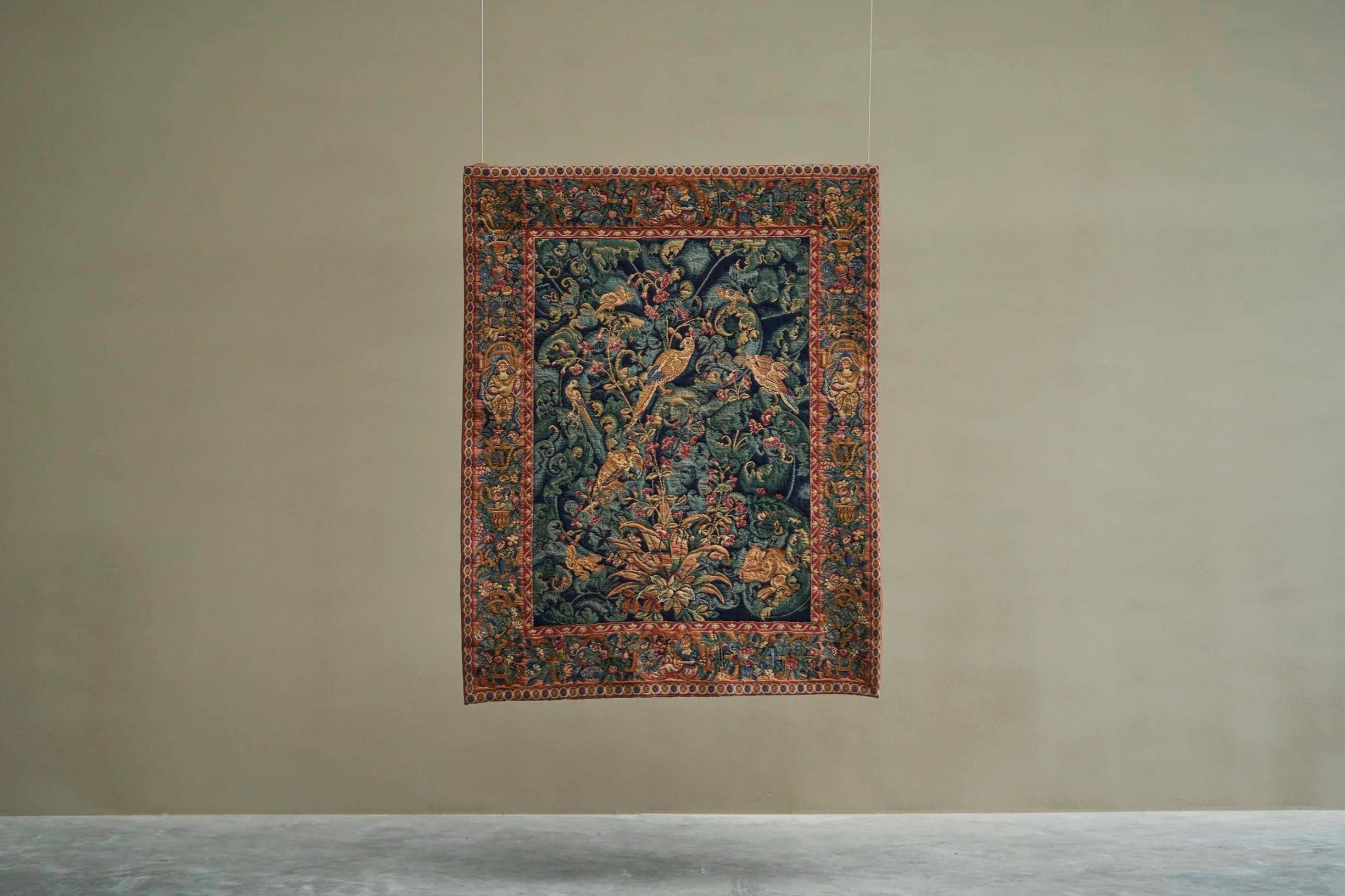 Mid Century wall tapestry with birds, animals, and leaves, Belgium 1960s.