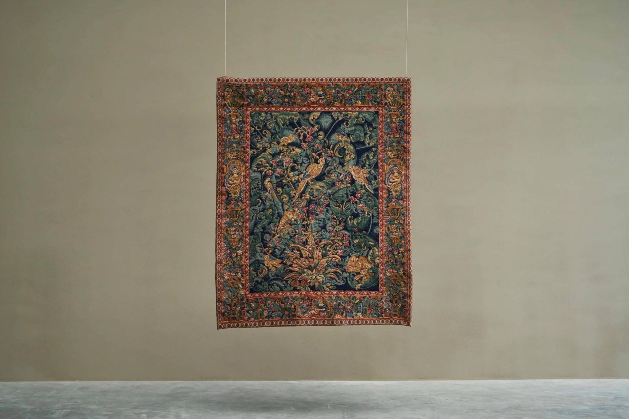 Mid Century wall tapestry with birds, animals, and leaves, Belgium 1960s.