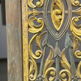 Rectangular Indonesian construction element with blue and yellow plant in carved wood