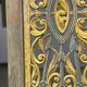 Rectangular Indonesian construction element with blue and yellow plant in carved wood